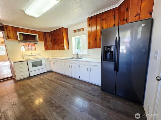 6818 Olympic Hwy, Aberdeen, WA 98520 - kitchen with a sink, white electric stove, stainless steel fridge with ice dispenser, light countertops, and dark wood-type flooring