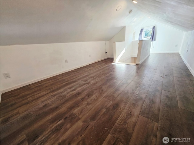6818 Olympic Hwy, Aberdeen, WA 98520 - additional living space with dark wood finished floors, lofted ceiling, and baseboards