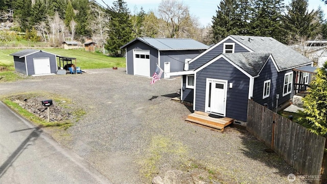 6818 Olympic Hwy, Aberdeen, WA 98520 - view of front of house with a garage and an outbuilding