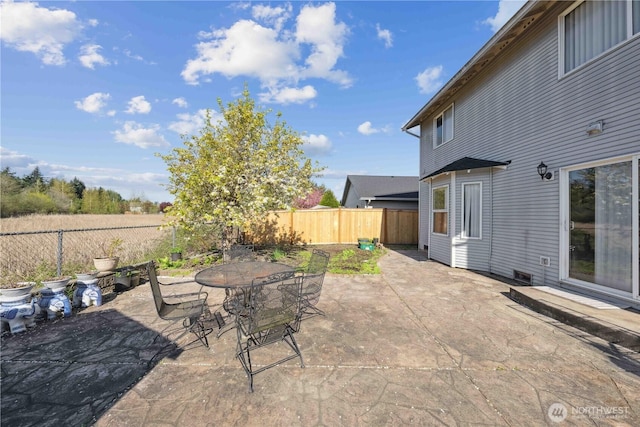 view of patio / terrace with a fenced backyard and outdoor dining space