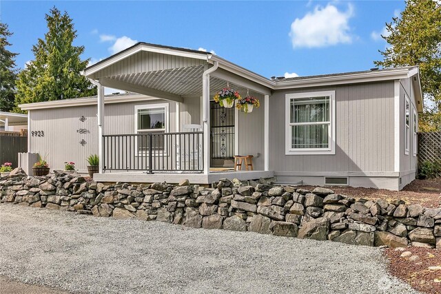 manufactured / mobile home with a porch