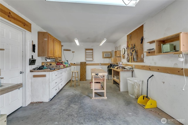 kitchen with concrete floors and open shelves