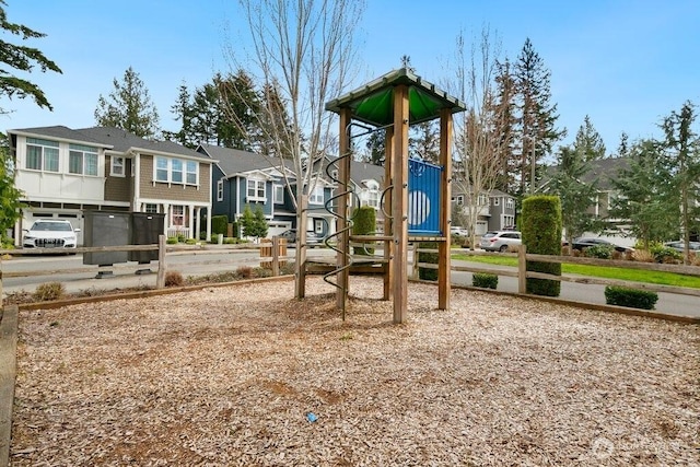community playground featuring a residential view