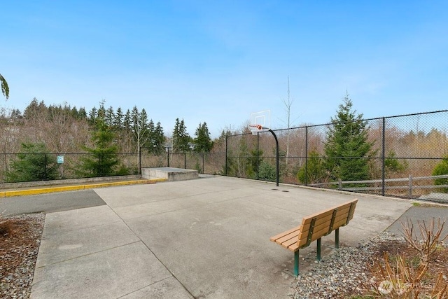 view of sport court with community basketball court and fence