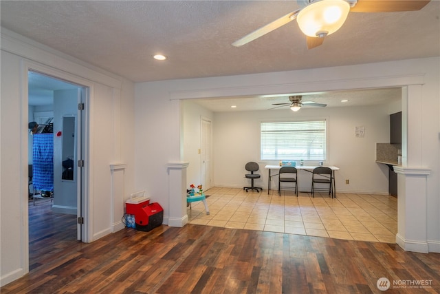 775 S 4th Ave, Othello, WA 99344 - interior space featuring ceiling fan, wood finished floors, baseboards, recessed lighting, and a textured ceiling