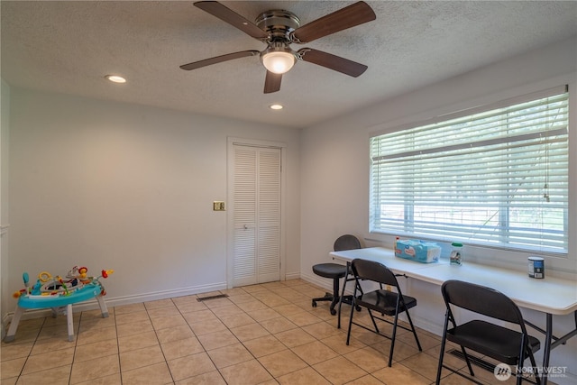 775 S 4th Ave, Othello, WA 99344 - office space with a textured ceiling, recessed lighting, light tile patterned flooring, ceiling fan, and baseboards