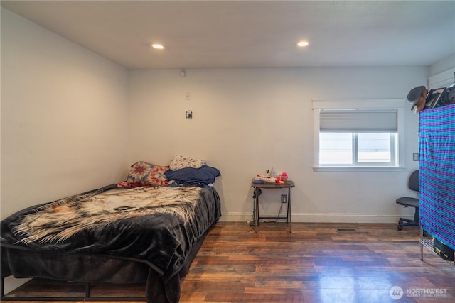 775 S 4th Ave, Othello, WA 99344 - bedroom with wood finished floors, baseboards, and recessed lighting