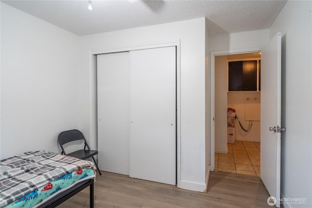 775 S 4th Ave, Othello, WA 99344 - bedroom featuring a closet and light wood-style flooring