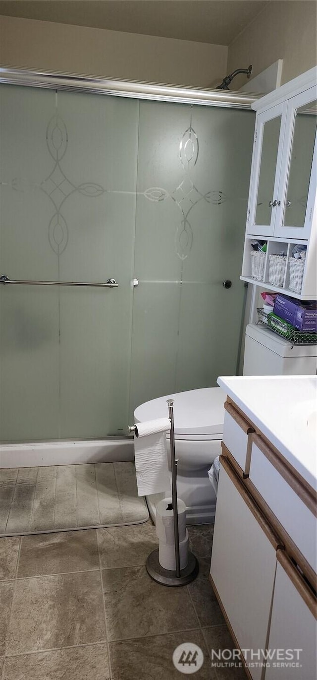 3605 NE 38th St, Vancouver, WA 98661 - bathroom with a stall shower, vanity, and toilet