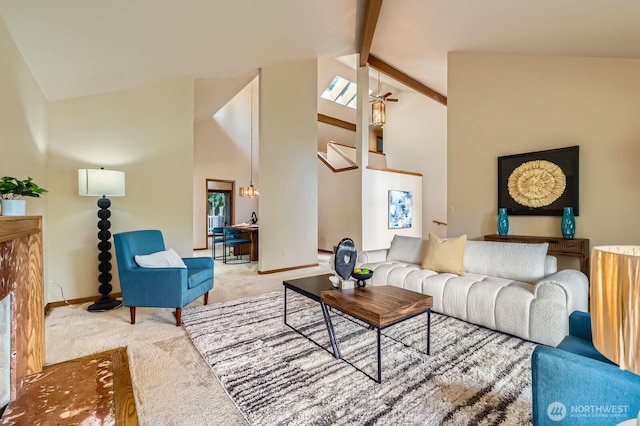 living room featuring carpet, baseboards, beamed ceiling, high vaulted ceiling, and a ceiling fan