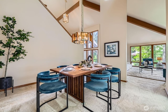 dining area featuring light carpet, high vaulted ceiling, a chandelier, baseboards, and beamed ceiling
