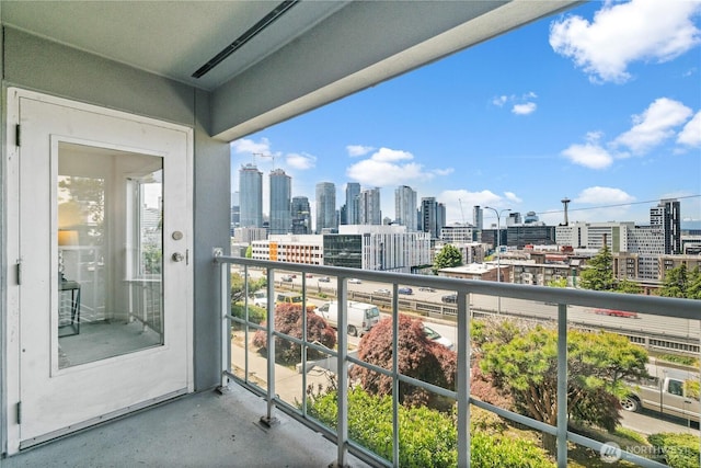 balcony featuring a city view