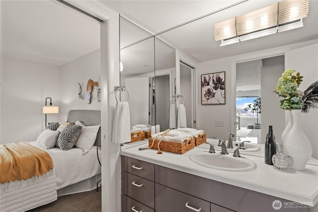 bathroom featuring vanity and connected bathroom