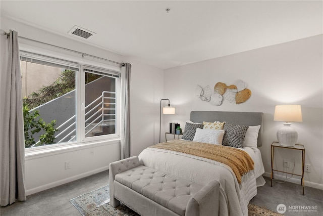 bedroom featuring baseboards, visible vents, and carpet floors