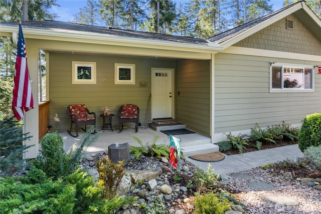 view of front facade with a patio area