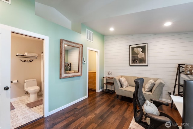 office with visible vents, recessed lighting, wooden walls, dark wood-style floors, and baseboards