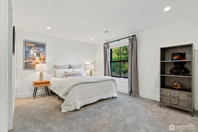 bedroom with recessed lighting, baseboards, and carpet