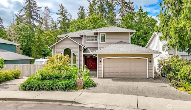 25171 13th Ave S, Des Moines, WA 98198 - traditional-style house featuring an attached garage, driveway, and a shingled roof