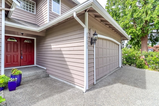 25171 13th Ave S, Des Moines, WA 98198 - doorway to property with a garage