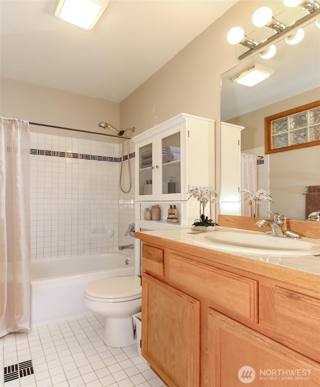 25171 13th Ave S, Des Moines, WA 98198 - bathroom with tile patterned flooring, vanity, shower / tub combo, and toilet