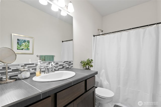 17431 3rd Ave SE, Bothell, WA 98012 - full bathroom featuring vanity, toilet, decorative backsplash, and curtained shower
