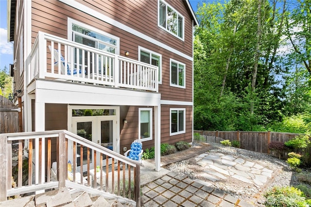 17431 3rd Ave SE, Bothell, WA 98012 - back of property featuring a balcony, a patio, and french doors