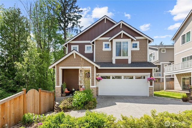 17431 3rd Ave SE, Bothell, WA 98012 - craftsman-style home featuring stone siding, a garage, driveway, and board and batten siding