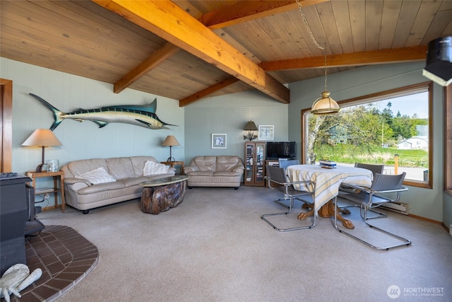 living room featuring carpet, a wood stove, vaulted ceiling with beams, and wood ceiling