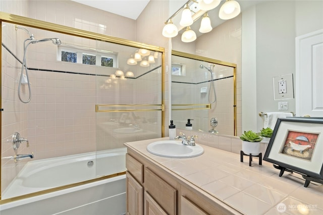 9821 NE Riverbend Dr Unit C102, Bothell, WA 98011 - bathroom featuring shower / bath combination with glass door and vanity