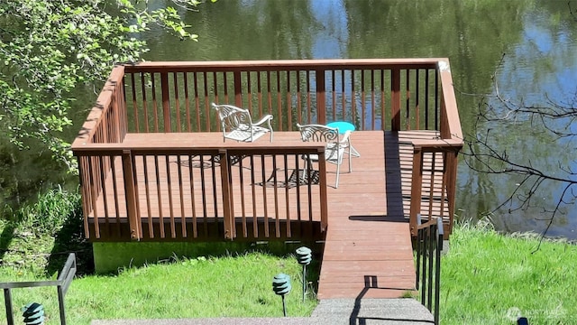 9821 NE Riverbend Dr Unit C102, Bothell, WA 98011 - wooden terrace with a water view and outdoor dining area