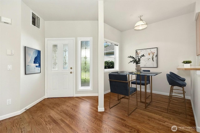 9821 NE Riverbend Dr Unit C102, Bothell, WA 98011 - foyer featuring wood finished floors and baseboards