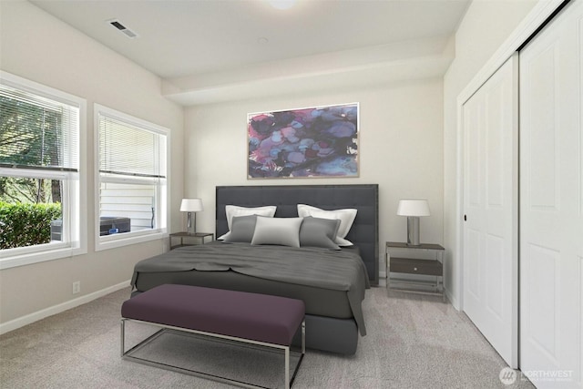 9821 NE Riverbend Dr Unit C102, Bothell, WA 98011 - bedroom with a closet, baseboards, and carpet flooring