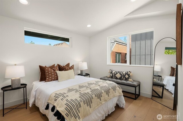 bedroom featuring vaulted ceiling, wood finished floors, recessed lighting, and baseboards