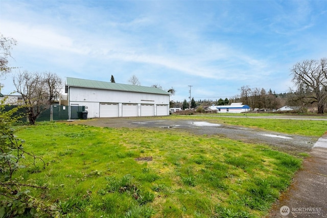 228 S 3rd St, Shelton, WA 98584 - exterior space featuring an outbuilding and a detached garage