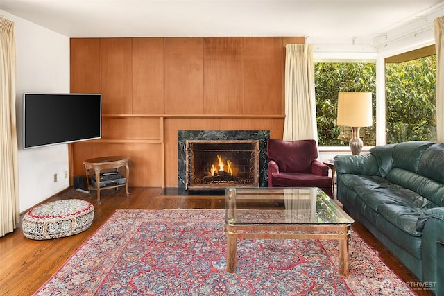 5429 NE Windermere Rd, Seattle, WA 98105 - living room featuring a fireplace and wood finished floors