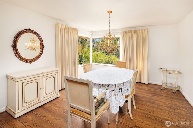 5429 NE Windermere Rd, Seattle, WA 98105 - dining room with an inviting chandelier, baseboards, and wood finished floors