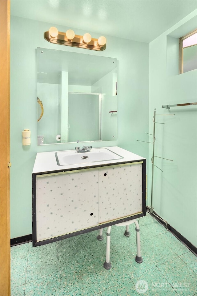 5429 NE Windermere Rd, Seattle, WA 98105 - full bathroom with baseboards, a shower with shower door, and vanity