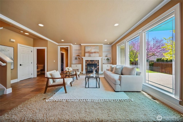 162 Costello Pl, Walla Walla, WA 99362 - living room with recessed lighting, ornamental molding, baseboards, a tiled fireplace, and built in features