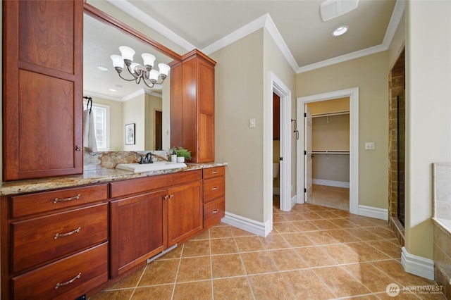 162 Costello Pl, Walla Walla, WA 99362 - full bath featuring a shower stall, a spacious closet, tile patterned floors, vanity, and crown molding