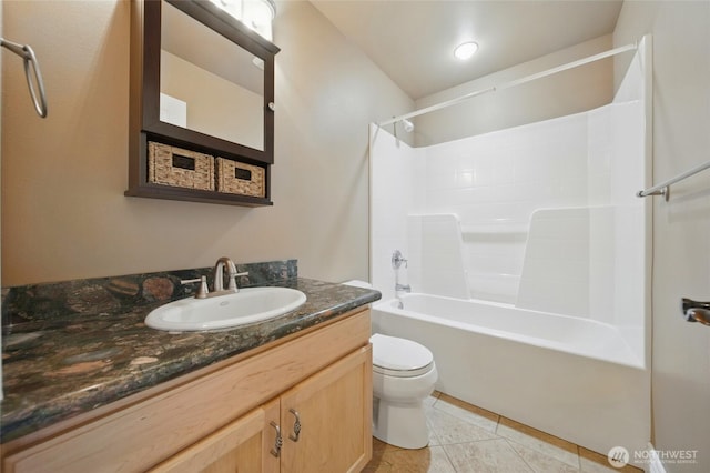 162 Costello Pl, Walla Walla, WA 99362 - bathroom featuring tile patterned flooring, toilet, vanity, and bathtub / shower combination