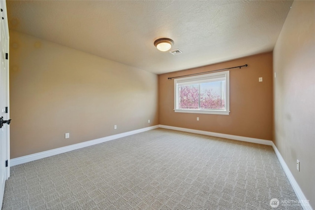 162 Costello Pl, Walla Walla, WA 99362 - spare room with light carpet, visible vents, and baseboards