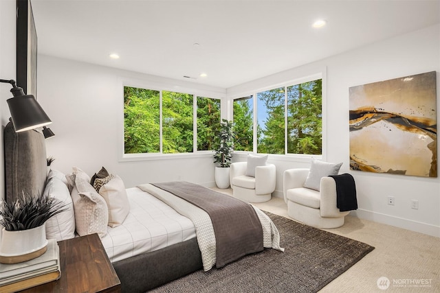 bedroom featuring carpet flooring, multiple windows, and recessed lighting