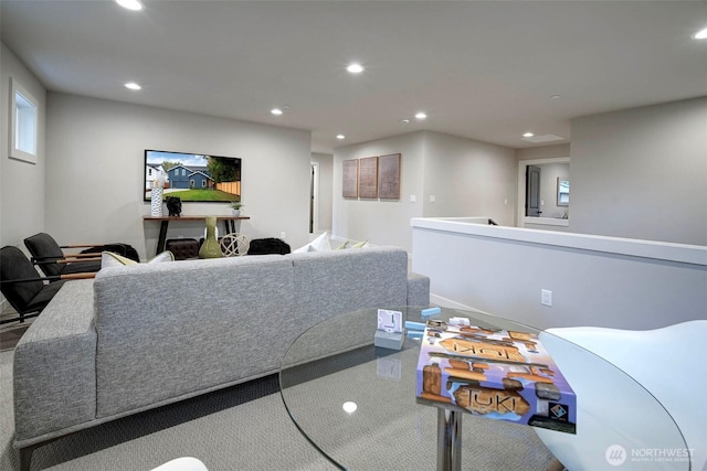 carpeted living area with recessed lighting