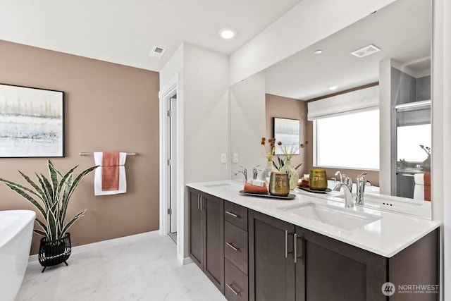full bathroom featuring visible vents, a sink, and marble finish floor