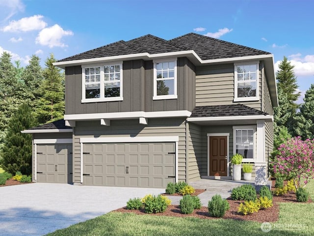 871 SE 11th Pl Unit 38, North Bend, WA 98045 - view of front facade with a garage, concrete driveway, board and batten siding, and a shingled roof
