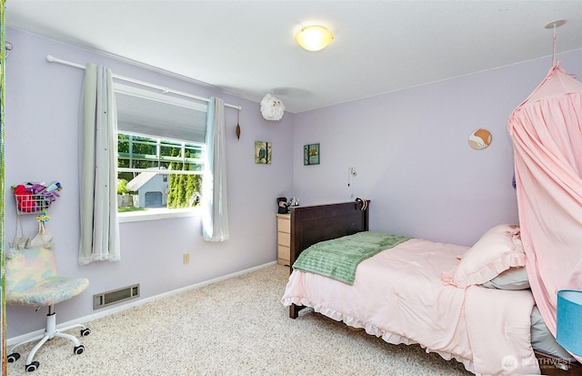 bedroom featuring visible vents, carpet floors, and baseboards
