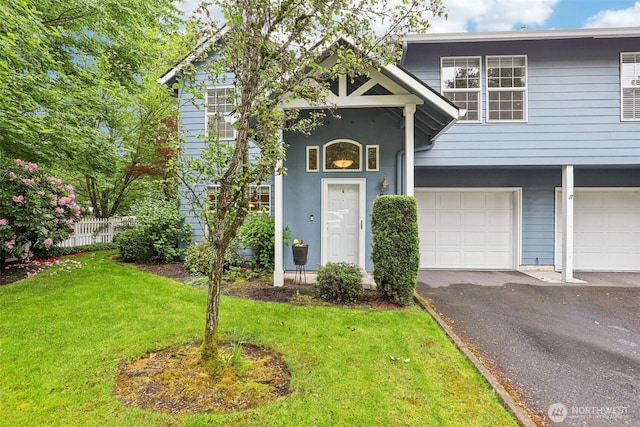 17200 SE 26th Dr Unit P56, Vancouver, WA 98683 - view of front of property featuring a garage and asphalt driveway