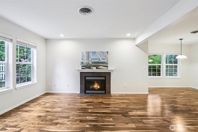 17200 SE 26th Dr Unit P56, Vancouver, WA 98683 - unfurnished living room featuring wood finished floors, a fireplace, baseboards, and recessed lighting