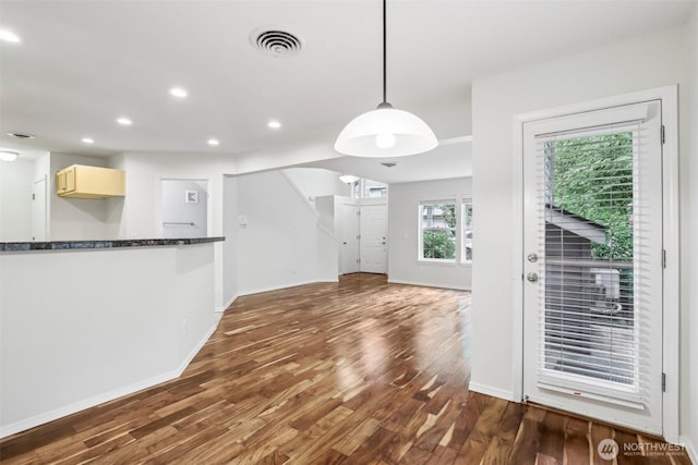 17200 SE 26th Dr Unit P56, Vancouver, WA 98683 - kitchen with dark wood-type flooring, recessed lighting, baseboards, pendant lighting, and dark stone counters