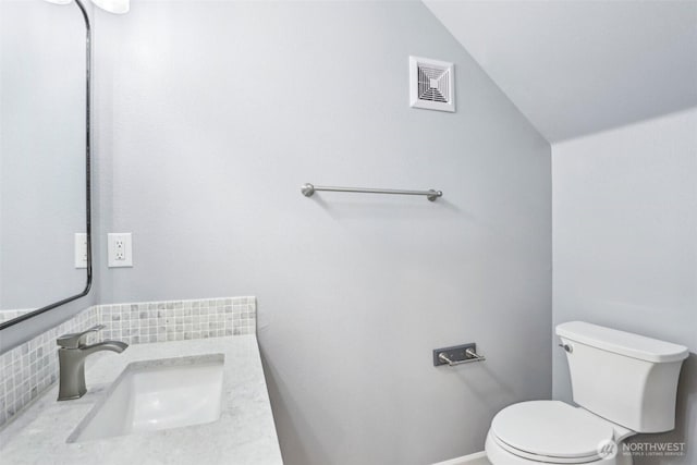 17200 SE 26th Dr Unit P56, Vancouver, WA 98683 - bathroom with toilet, lofted ceiling, and vanity
